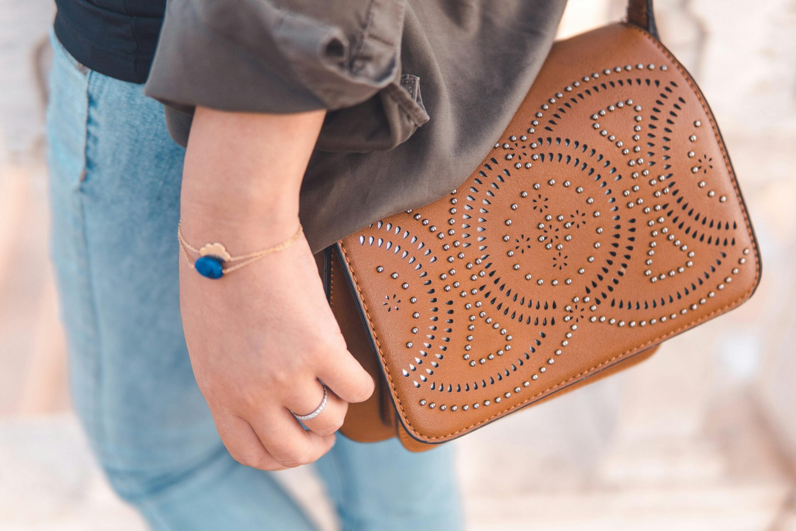 Close-up of a stylish handcrafted bag with a detailed bracelet, reflecting Moroccan elegance and fashion.